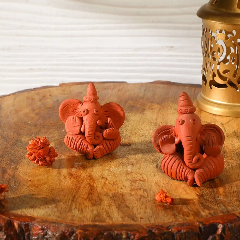 Set of 4 terracotta statues on sale